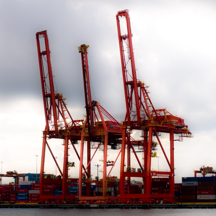 Container-handling cranes at Vancouver harbor Container-handling cranes at Vancouver harbor